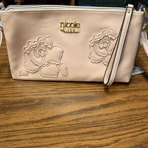 Nicole Miller Pale Pink Floral Embossed Wristlet with Gold Logo
